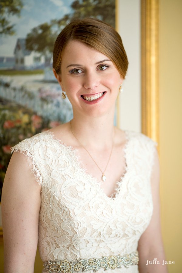 bride getting ready at the water's edge resort and spa