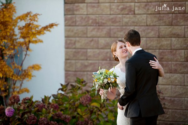 bride and groom at the water's edge in westbrook, ct